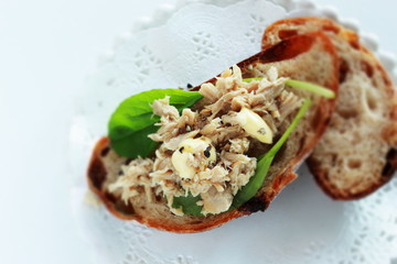 Tuna fish and baby leaves open sandwich for healthy breakfast