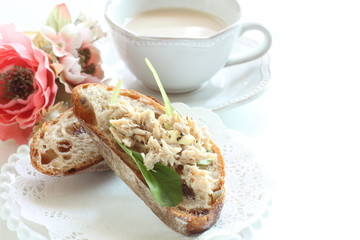 Tuna fish and baby leaves open sandwich for healthy breakfast