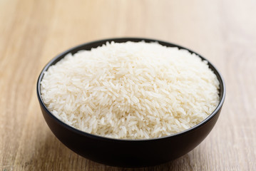 Organic Thai Jasmine rice grain in a bowl preparing for cooked