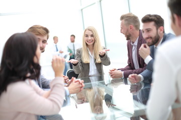 young businesswoman explaining new tasks at a working meeting.