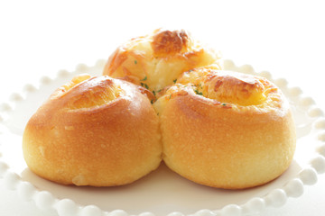 Garlic bread on white dish with copy space