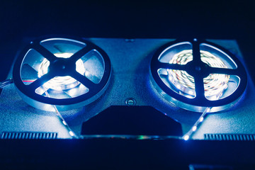 reel to reel audio tape recorder with blue led light strip