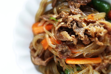 Homemade korean food, glass noodles and vegetable stir fried with beef Japchae