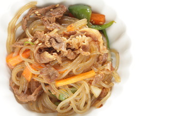 Homemade korean food, glass noodles and vegetable stir fried with beef Japchae