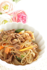 Homemade korean food, glass noodles and vegetable stir fried with beef Japchae