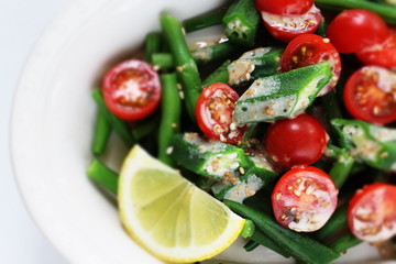 Homemade cherry tomato and Okra with sesame dressing salad