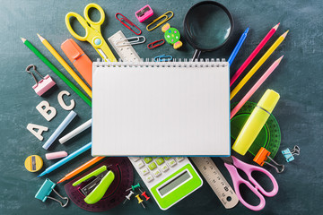Education or back to school Concept. Top view of Colorful school supplies with books, color...