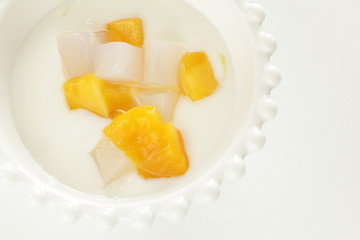 Mango and nada de coco in yogurt for healthy dessert