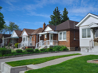 street with old fashioned 1950s style working class bungalows - 351752840
