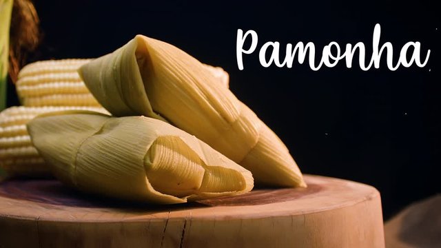 A typical Brazilian food, Pamonha. Beside it appears written in Portuguese: Pamonha