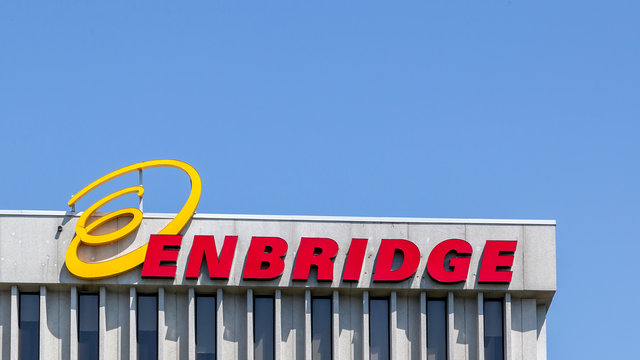 Toronto, Ontario, Canada - May 24, 2018: Enbridge sign on the building in Toronto with text space above. Enbridge Gas Distribution Inc is a Canadian multinational energy transportation company.