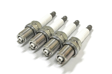 New spark plug on white background, isolated.