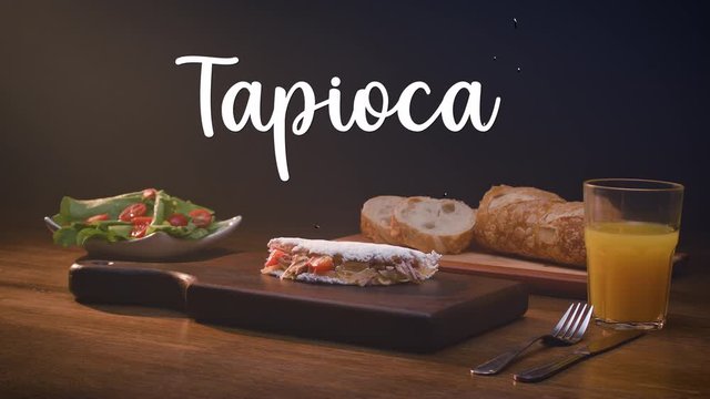 A typical Brazilian food, Tapioca. Beside it appears written in Portuguese: Tapioca