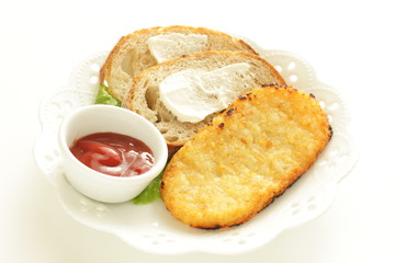 Hashed brown fried potato and bread
