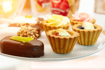 Small cakes in baskets. Sweet dessert.