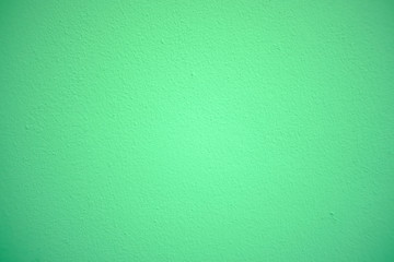 Light green concrete cement wall texture for background and design art work.