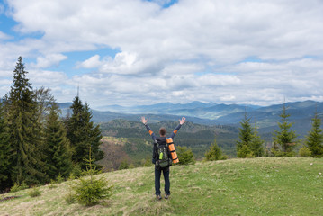 Obraz premium hiker with equipment spends time hiking in the mountains