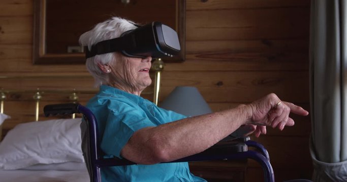 Woman using virtual reality headset at home