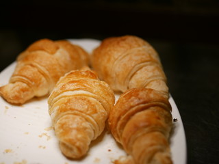 Variety of sweet bread for breakfast or snack. Variety sweet bread breakfast snack unhealthy. Croissant.