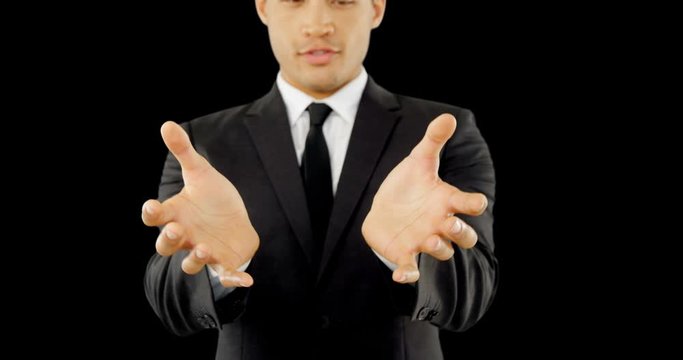 Businessman raising his opened hands