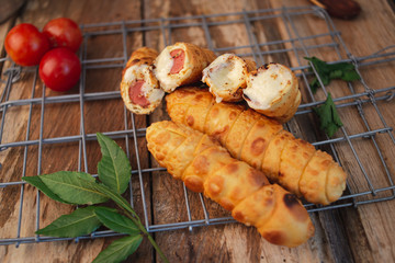 Cheese fingers with sausage inside