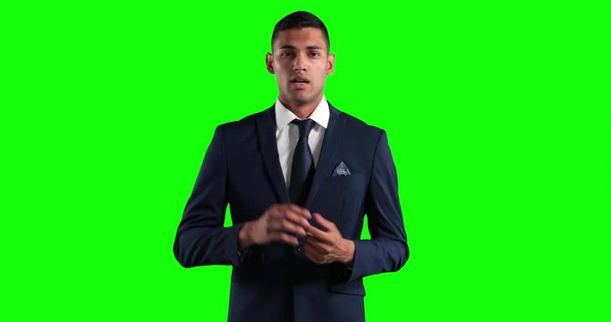 Animation of mixed-race man in suit talking in a green background