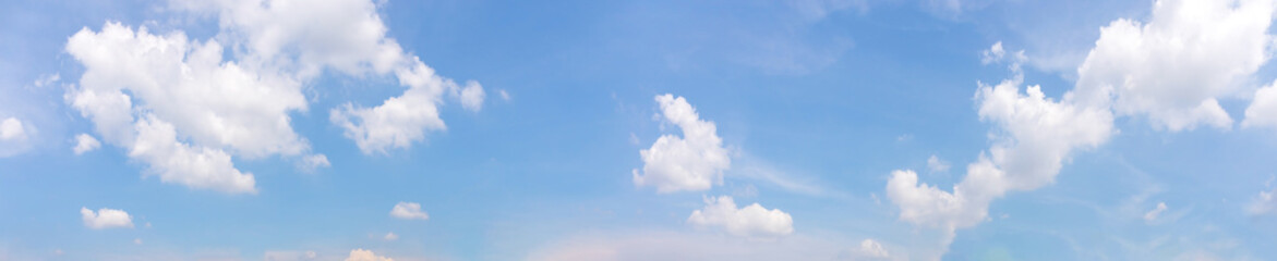 Panorama or panoramic photo of blue sky and white clouds or cloudscape.