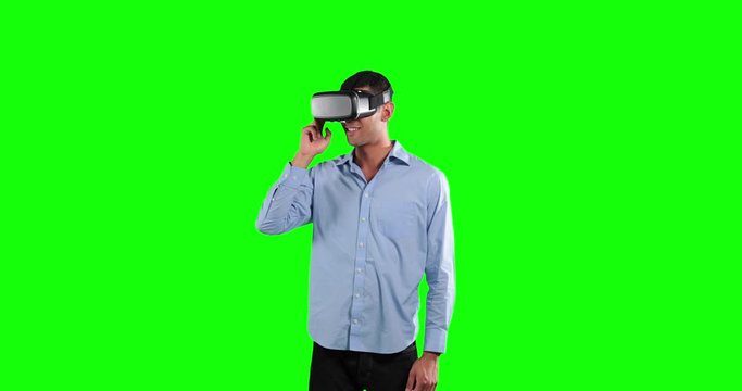 Animation of a man wearing 3D goggles in a green background