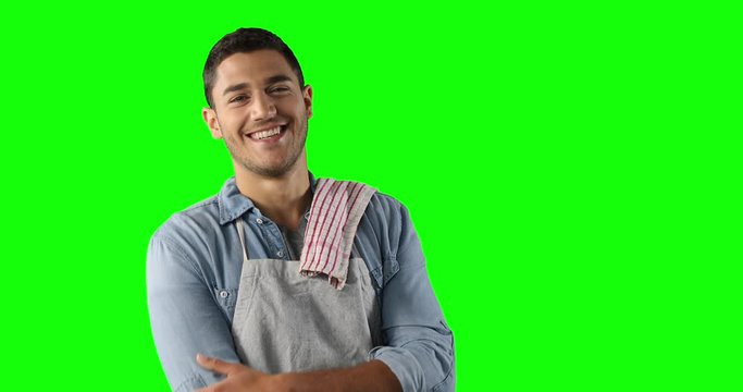 Man with an apron on a green background