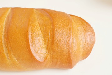 foto parcial de una barra de pan recién hecho, pan, tostado, panadería, sabroso