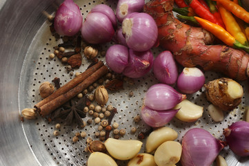 Indonesia herbs and spices on wooden table. Top view with selective focus.                              