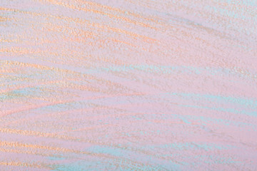 Golden brush strokes on pink pastel background. Dry brush technique. Hand painted background