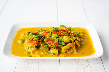 Spicy stir fried pork with Cluster Bean (Bitter Bean or stink beans) popular southern Thai food on...
