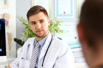 Doctor in white uniform with stethoscope