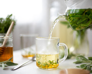 hot herbal tea with mint in a glass bowl