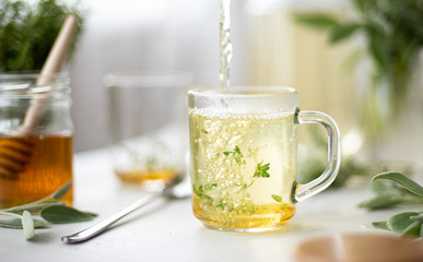 hot herbal tea with mint in a glass bowl