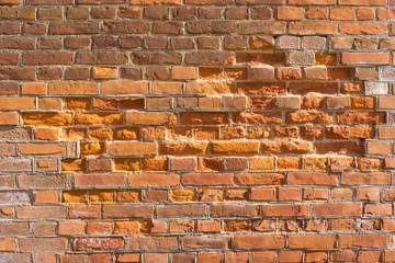 Texture of an old red brick wall