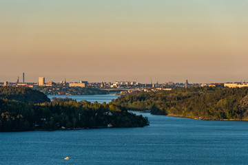 Fototapeta premium Stockholm, Sweden A view from the Ekero suburb towards the center of town and Lake Malaren.