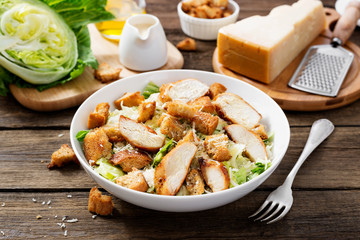 Classic caesar salad with grilled chicken fillet and parmesan cheese.
