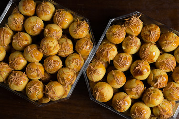 Nastar, an eid cookies with dark background and directional studio light