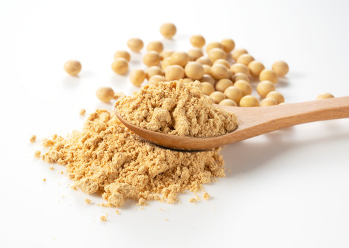Japanese Kinako and soybeans in a spoon on a white background