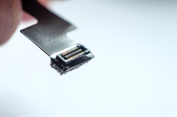Close-up flat cable flex cable on white background.