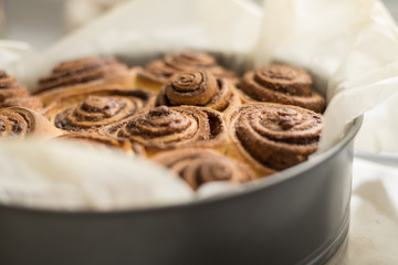 Fresh rolls Cinnabon, Cinnamon rolls in the form. Flavorful pastries