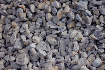a large pile of stones on the street