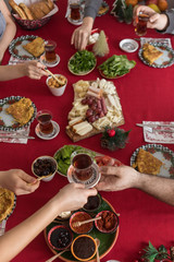 New Year Breakfast at home. Homemade Breakfast with family with red background. Traditional Turkish Breakfast. ( Selective focus)