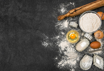 Fototapeta na wymiar Flour eggs cookie forms Baking ingredients dough preparation