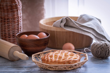 Fresh homemade open pie with cottage cheese and raisins. Traditional Russian yeast pastries, cheesecake, round buns, cottage cheese pie. Buns with cottage cheese and raisins.