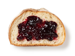 Blueberry jam and bread on a white background
