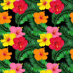 Palm leaves and hibiscus flowers on a black background. Tropical seamless pattern design for wallpaper, textile, fabric.