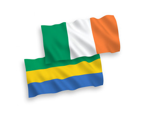Flags of Ireland and Gabon on a white background